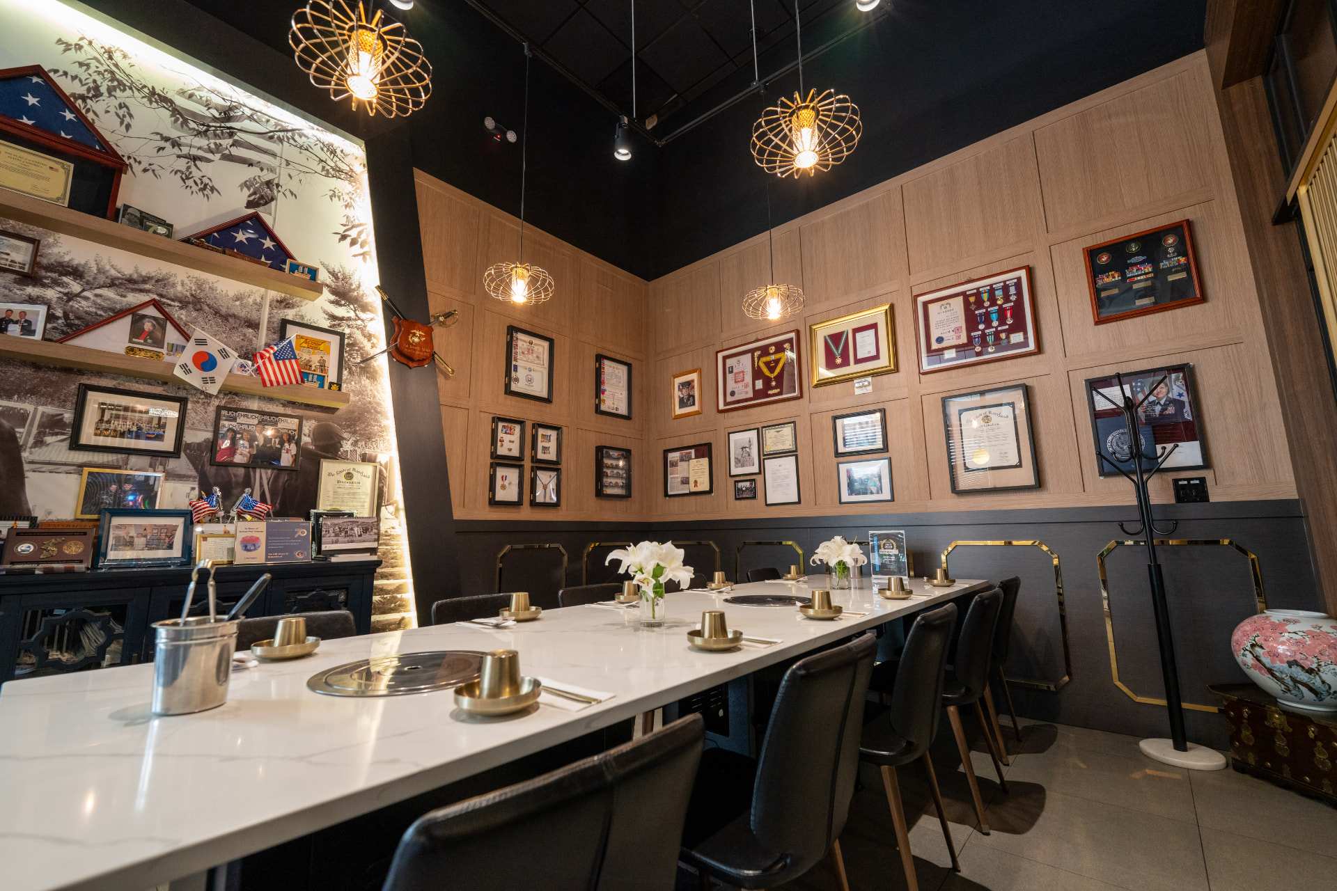 The Honor Room at Koho Korean BBQ House, a private dining room with tabletop grills and walls of American and Korean service honors