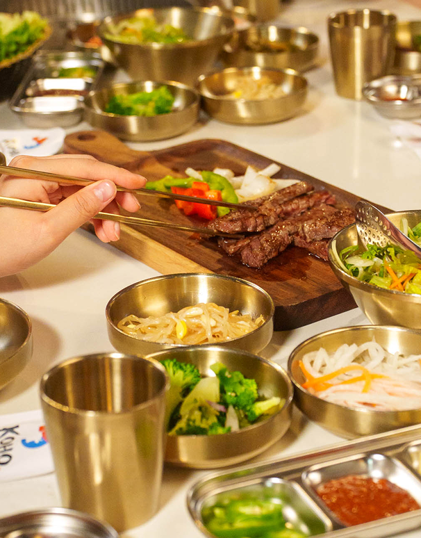 Traditional Korean side dishes on the table at Koho
